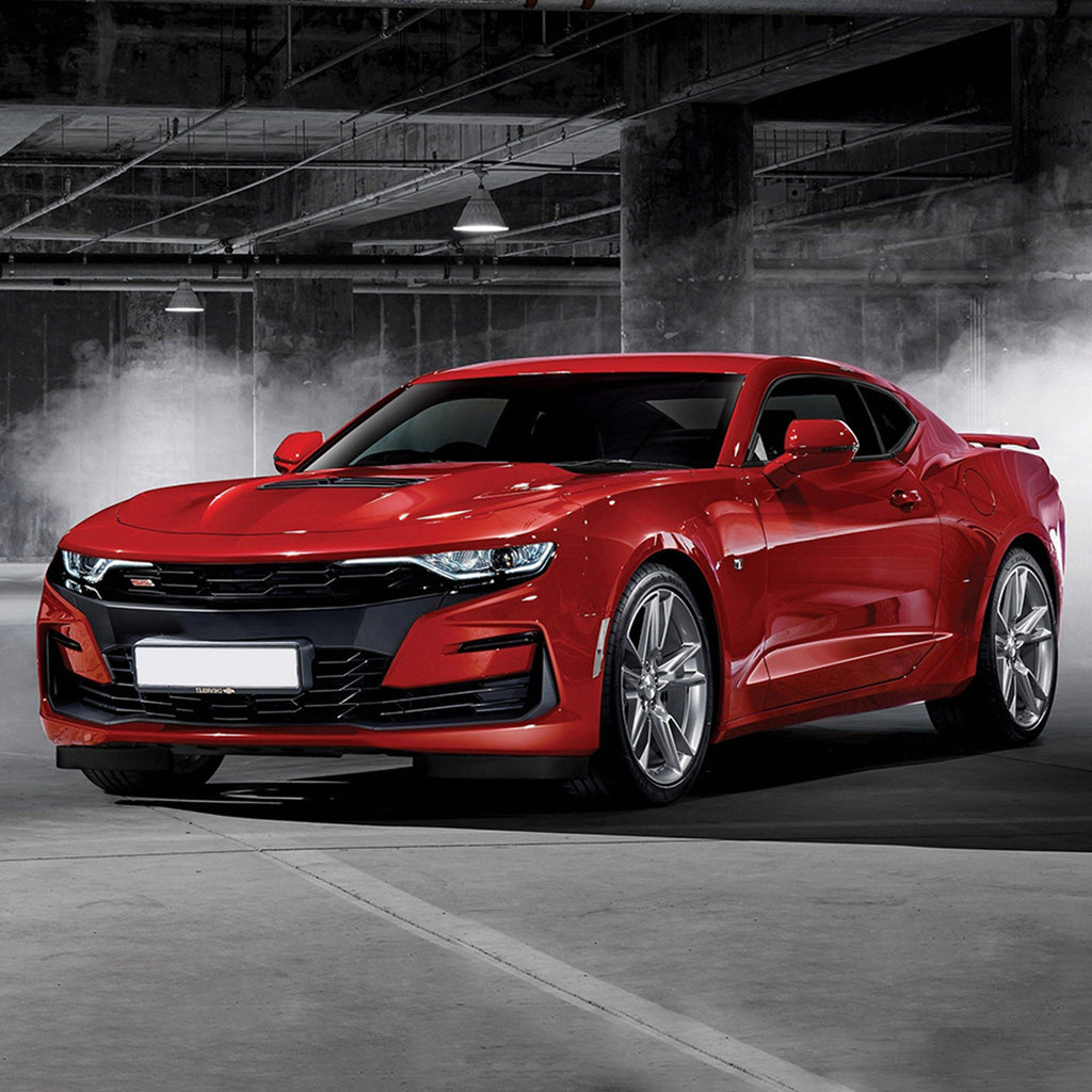 Close-up of left-side VLAND LED headlight assembly, clear lens and black interior.